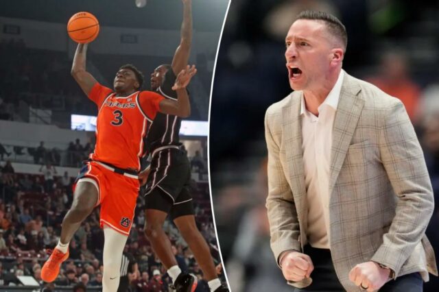 O atacante do Auburn Tigers, KeShawn Murphy (3), vai para a cesta enquanto o guarda do Mississippi State Bulldogs, Shawn Jones Jr. (5), defende durante o primeiro tempo.