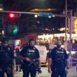 O suposto atirador do Austin Bar usava uma camisa com a bandeira iraniana sob o moletom 'Propriedade de Alá'