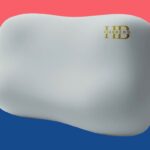 Almofada cinza claro com dourado