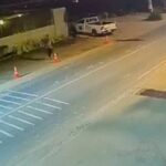 CCTV mostra Jordan, no canto superior direito, correndo erraticamente ao longo da estrada pouco antes de ser encontrado morto