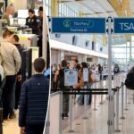 Passageiros na fila de segurança.