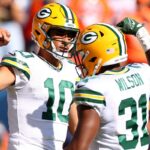 Green Bay Packers RB Emanuel Wilson and QB Jordan Love