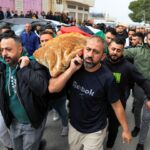 Palestinos enterram quatro mulheres mortas em ataque com míssil iraniano