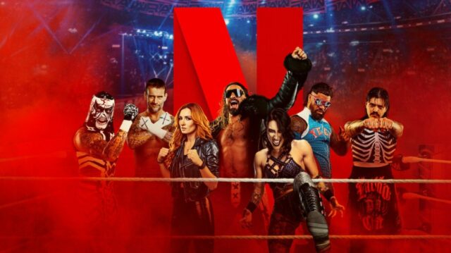 Paul Heyman provoca 'End of Seth Rollins' na 'WrestleMania 42' A group of wrestlers in a ring, with a giant red letter 'N' behind them