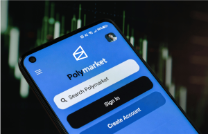 Polymarket aperta as regras de negociação com informações privilegiadas à medida que o escrutínio cresce nos mercados de previsão Interface do aplicativo Polymarket no smartphone mostrando plataforma de negociação de mercado de previsão com histórico de gráfico financeiro e tela de login do usuário. Polymarket aperta as regras de negociação com informações privilegiadas à medida que o escrutínio cresce nos mercados de previsão