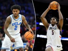 Previsão UCLA x UConn: escolhas, probabilidades e melhor aposta do March Madness 2026 para a segunda rodada de domingo O guarda da UCLA, Donovan Dent, dribla a bola contra o guarda da UCF, Chris Johnson, durante o torneio da NCAA.
