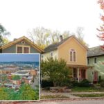 Três casas coloridas de dois andares em um bairro suburbano com folhagem de outono.