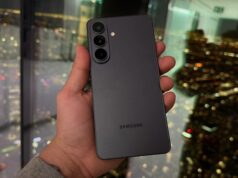 Samsung se junta ao Google para oferecer suporte AirDrop Um Pixel 9 Pro ao lado de um iPhone 15 Pro Max em uma mesa de vime