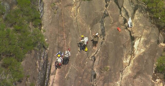 Um adolescente morreu e outro está lutando pela vida depois que a dupla caiu durante uma caminhada nas Glasshouse Mountains, na Sunshine Coast, em Queensland.