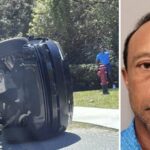 Woods é visto ao lado de seu Range Rover capotado na Ilha de Júpiter, Flórida.