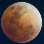 Todas as melhores fotos da rara lua de sangue da noite passada