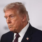 Desenho animado de Mike Luckovich