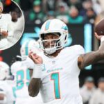 07/12/25 – Miami Dolphins x New York Jets no MetLife Stadium – O quarterback do Miami Dolphins, Tua Tagovailoa # 1, lança um passe durante o terceiro quarto.