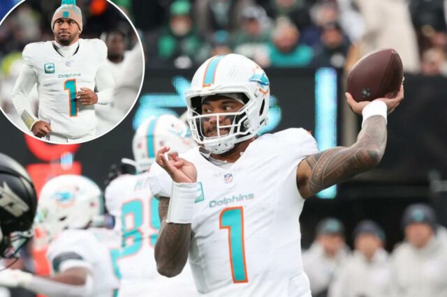 07/12/25 – Miami Dolphins x New York Jets no MetLife Stadium – O quarterback do Miami Dolphins, Tua Tagovailoa # 1, lança um passe durante o terceiro quarto.