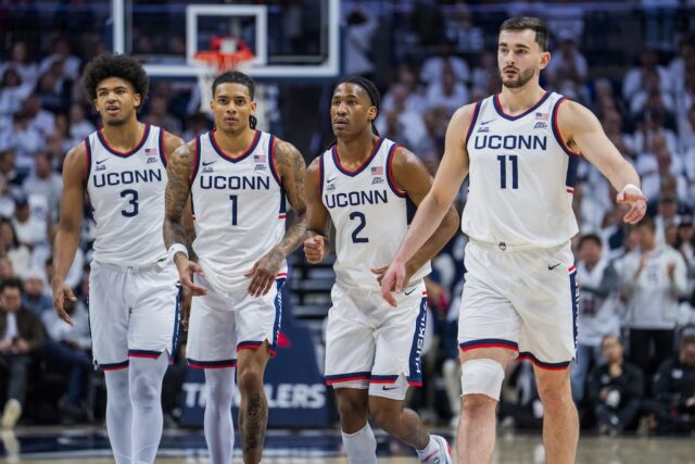 UConn Huskies players, including Jaylin Stewart and Silas Demary Jr.