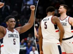 UConn se defende do último esforço do estado de Michigan para avançar para a Elite Oito O atacante do UConn Huskies Alex Karaban (11) e o atacante Tarris Reed Jr. (5) reagem após o jogo em um jogo Sweet Sixteen da East Regional do torneio masculino da NCAA de 2026 na Capital One Arena.