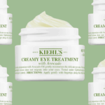 Tratamento Cremoso para Olhos Kiehl's com Abacate em frasco branco, com algum produto por cima.