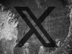 X diz que suspenderá os criadores do programa de divisão de receitas para postagens de IA não rotuladas de ‘conflito armado’ X (formerly Twitter) logo on a cracked wall