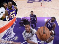 Ziaire Williams defendendo forte posição para fazer parte da reconstrução do Nets O atacante do Nets Ziaire Williams (1) defende LeBron James (23) do Lakers em 27 de março de 2026.