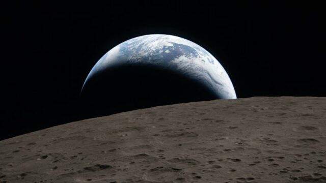 A Terra está em crise, mas em Artemis II não O Comandante Reid Wiseman olha para a Terra pela janela de uma cabine.