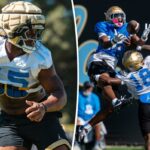 O técnico de futebol da UCLA, Bob Chesney, em campo com os jogadores.