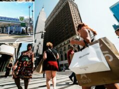 A confiança do consumidor caiu para um nível recorde este mês, revela o estudo – embora os gastos mostrem um vislumbre de esperança Uma mulher passa pela vitrine de uma loja de varejo com cinco manequins.