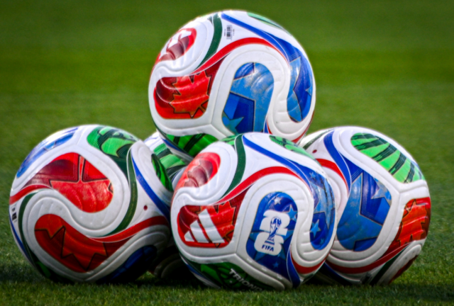 Official 2026 FIFA World Cup match balls, named Trionda, are seen on the field ahead of a friendly football match between Brazil and Croatia at Camping World Stadium in Orlando, Florida, on March 31, 2026.