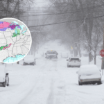 A truck plows snow during a blizzard, March 16, 2026 in Madison, Wisconsin.