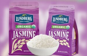 Arroz branco popular enfrenta recall nacional por causa de ‘material estrangeiro’ Dois sacos roxos de arroz de jasmim branco Lundberg Organic California e uma tigela de arroz branco.
