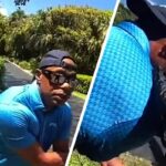 Assistir: A câmera da polícia mostra Tiger Woods ajoelhado, segurando seu braço durante a prisão por dirigir alcoolizado