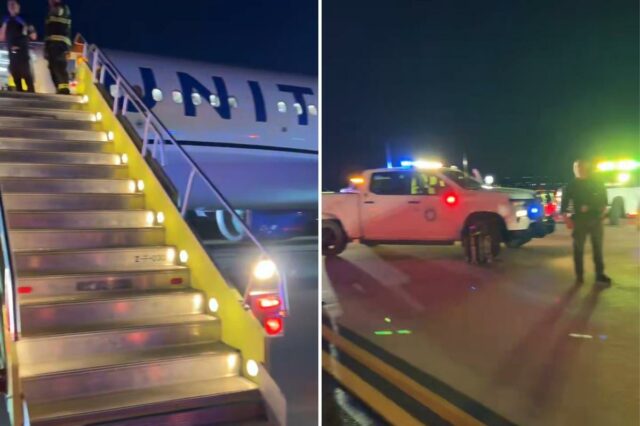 Membros da tripulação de emergência nas escadas que levam a um avião da United Airlines após uma ameaça de bomba.