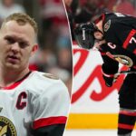 Brady Tkachuk (7), do Ottawa Senators, abaixa a cabeça depois que o time foi eliminado pelo Carolina Hurricanes após perder no jogo 4 da primeira rodada da série de playoffs de hóquei da NHL Stanley Cup, sábado, 25 de abril de 2026, em Ottawa, Ontário.