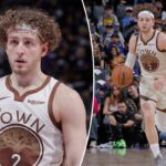 Brandin Pod Ziemia com uma camisa branca e marrom do Golden State Warriors.