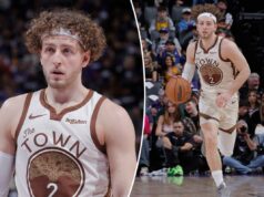 Brandin Podbierz, do Warriors, põe fim ao tweet viral com o primeiro jogo de 30 pontos Brandin Pod Ziemia com uma camisa branca e marrom do Golden State Warriors.