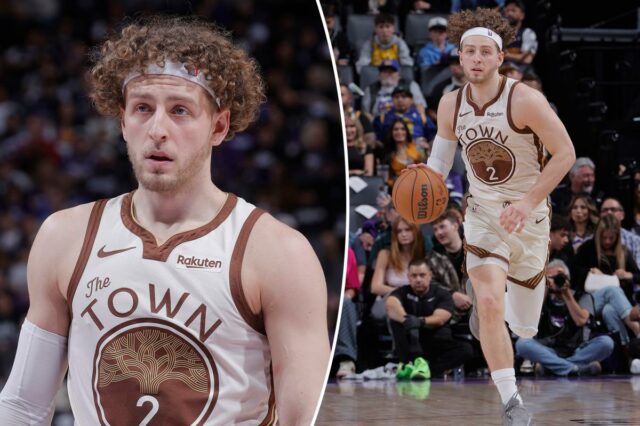 Brandin Pod Ziemia com uma camisa branca e marrom do Golden State Warriors.