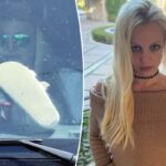 Britney Spears com os pés no painel de um Mercedes G-Wagon.