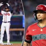 Dominic Smith reagindo na segunda base após acertar uma dobradinha de limpeza de bases.