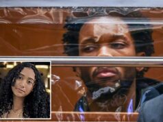 D4vd colocado em segregação após mudança repentina de prisão após estupro de 14 anos e acusações de assassinato David Anthony Burke no tribunal, olhando através de uma tela de plástico, com um advogado em primeiro plano.