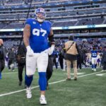 Dexter Lawrence II nº 97 do New York Giants sai de campo no final do jogo no MetLife Stadium, domingo, 21 de dezembro de 2025, em East Rutherford, Nova Jersey.