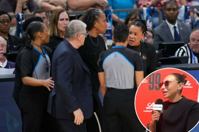 Diana Taurasi reage ao confronto inflamado entre Geno Auriemma e O técnico do UConn Huskies, Geno Auriemma, e o técnico do South Carolina Gamecocks, Dawn Staley, discutem com um árbitro durante um jogo da Final Four do torneio feminino da NCAA de 2026.