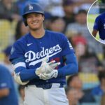 O jogador bidirecional do Los Angeles Dodgers, Shohei Ohtani, no convés, sorrindo.