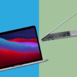 Um laptop MacBook Pro em cinza espacial, aberto para mostrar o teclado com Touch Bar e um plano de fundo colorido e abstrato da área de trabalho.