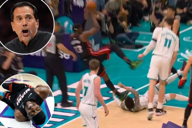 Erik Spoelstra ataca LaMelo Ball por 'jogada perigosa' que feriu O central do Heat, Bam Adebayo, se contorce de dor depois de ser derrubado pelo LaMelo Ball do Hornets no segundo quarto, em 14 de abril de 2026.