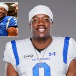 Chris Payton-Jones em uma camisa de futebol branca com detalhes em azul e o logotipo da UFL.