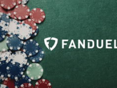 FanDuel aprovado para expansão da rede de pôquer multiestadual em Michigan FanDuel aprovado para expansão da rede de pôquer multiestadual no mercado de Michigan. Logotipo FanDuel na mesa de pôquer verde com fichas de cassino vermelhas, brancas e azuis, empilhadas em fundo de feltro