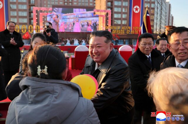 North Korean leader Kim Jong Un congratulating residents moving into their new homes at the inauguration ceremony of 10,000 flats at fourth stage in Hwasong area of Pyongyang.