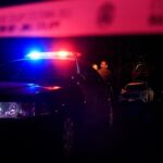 LAPD officers keep watch as the police investigate two people found dead in Rob Reiner's home on December 14, 2025 in Brentwood, California.