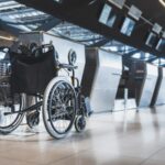A wheelchair in an airport.