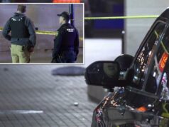 Jovem de 17 anos procurado por tentativa de homicídio em tiroteio em massa perto da Universidade de Iowa: polícia Dois policiais de Iowa City atrás da fita da cena do crime.