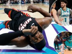 LaMelo Ball aprende punição da NBA após tropeçar em Bam Adebayo: ‘Contato imprudente’ Um jogador de basquete de uniforme preto e vermelho segurando uma bola de basquete, saltando sobre outro jogador de uniforme branco e verde que caiu no chão.